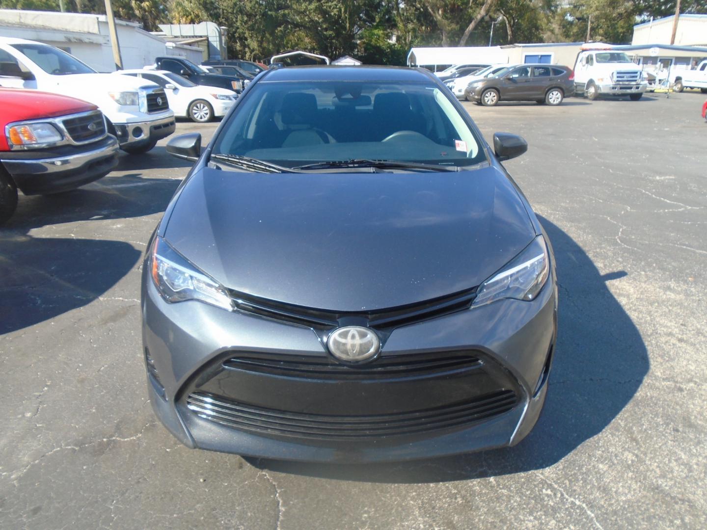 2018 Toyota Corolla (5YFBURHE9JP) , located at 6112 N Florida Avenue, Tampa, FL, 33604, (888) 521-5131, 27.954929, -82.459534 - Photo#1